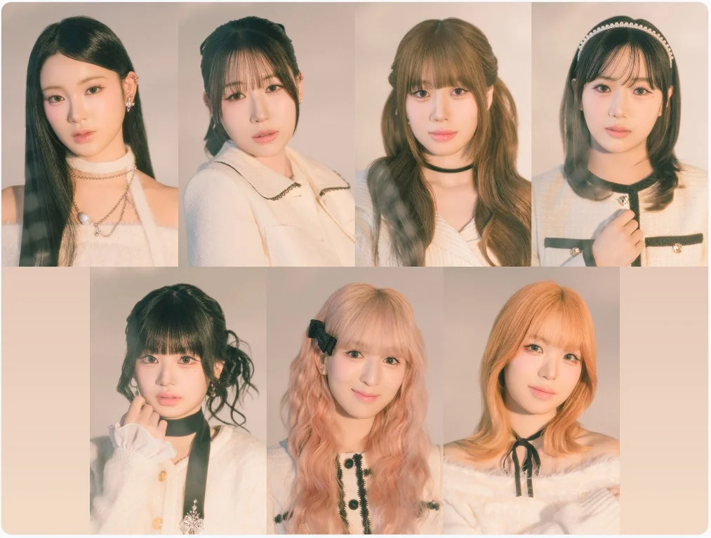 白い衣装を着用した若い女性7人のポートレート写真