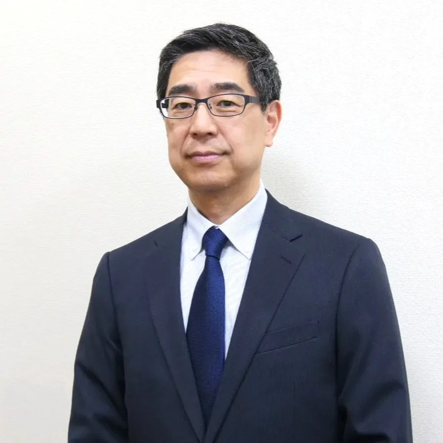 眼鏡をかけた中年男性のプロフィール画像